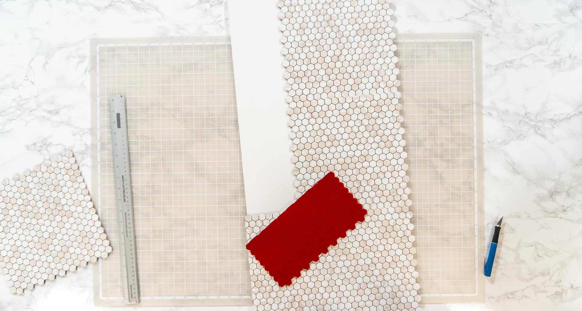Hand-stitched samplers and swatches laid out